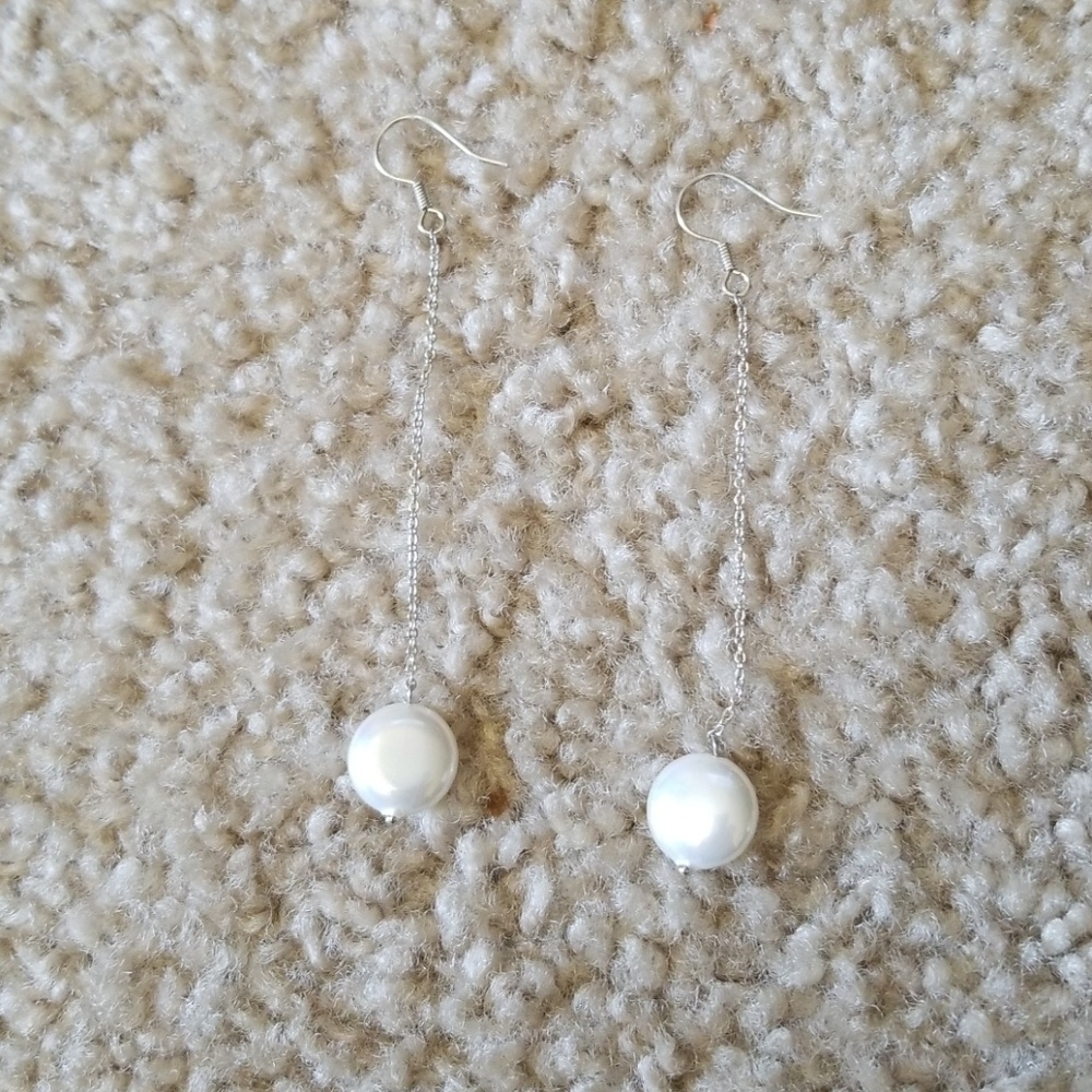 Long silver elegant earrings